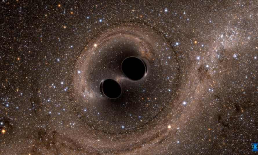 La collisione di due buchi neri – un evento rilevato per la prima volta in assoluto dal Laser Interferometer Gravitational-Wave Observatory, o Ligo – è vista in questa immagine da una simulazione al computer.