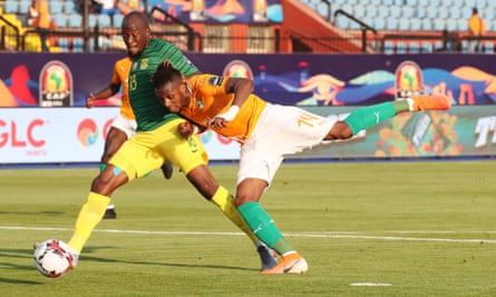 Jonathan Kodjia (right) scores the only goal of the game to give Ivory Coast the points against South Africa in Cairo.