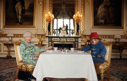 The Queen having tea with Paddington Bear, London, UK