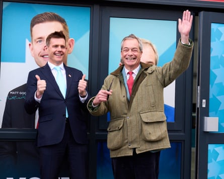 Farage smiles and waves and Goodwin gives a double thumbs-up.