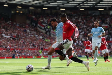 Marcus Rashford of Manchester United (R) in action against Matheus Nunes of Manchester City.