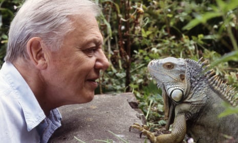 Sir David Attenborough with an iguana from Living With Dinosaurs.
