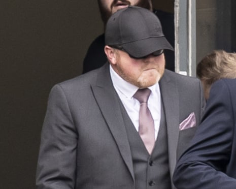Robert Bush arriving at Hull magistrates court in 2025, wearing a suit, peaked cap and sunglasses