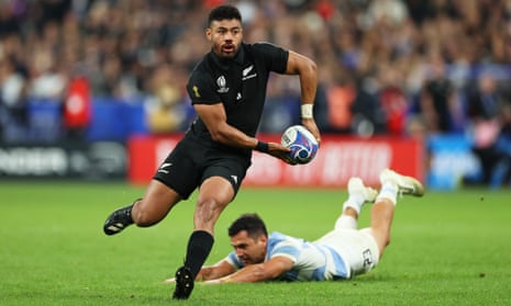 Richie Mo'unga of New Zealand looks to pass the ball during the Rugby World Cup semi-final against Argentina.