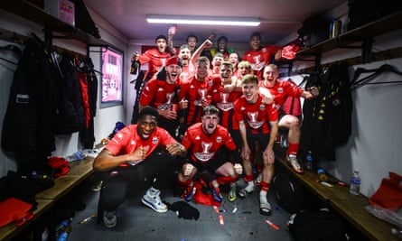 Truro City players celebrate promotion. They may not look as happy after their journey up to Gateshead.