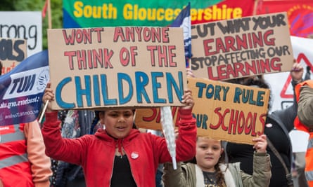 children with protest banners