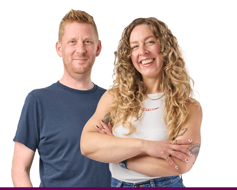 Alex, with short blond hair and a navy T-shirt, and Ellie, wearing a white sleeveless top, with curly blond hair and her arms crossed
