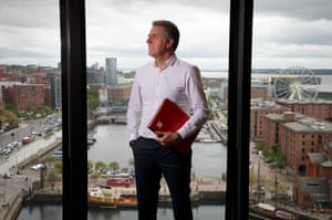 Steve Rotheram, the Metro Mayor for Liverpool in his office overlooking the waterfront area.
