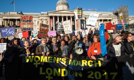 Protesters chant as they arrive in Trafalgar Square during the Women’s March on London.