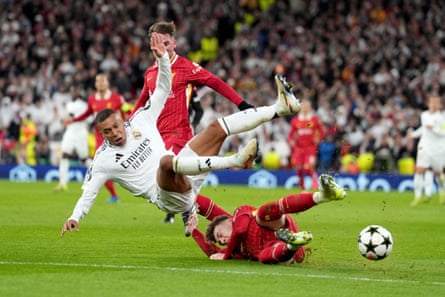 Conor Bradley slide tackles Kylian Mbappé