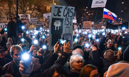 Banners are waved during Friday’s mass protests across 34 cities in Slovakia.