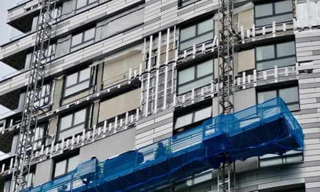 Cladding being replaced on block of flats