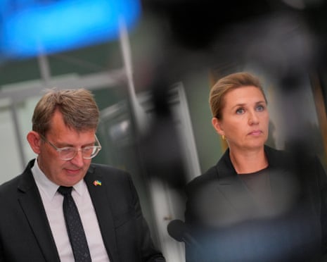 Troels Lund Poulsen and outgoing prime minister Mette Frederiksen