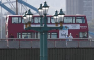 Police forensics investigators work on London Bridge