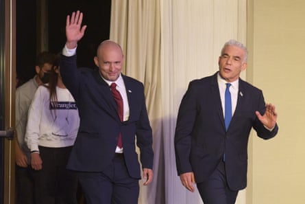 Bennett and Lapid waving