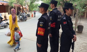 Police patrolling the old town in Kashgar, Xinjiang