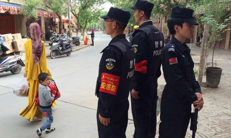 Police patrolling the Old Town in Kashgar, a 2,000-year-old oasis city in China’s far west.
