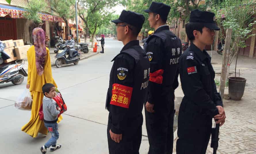 Police on patrol in Kashgar, in the Xinjiang region.