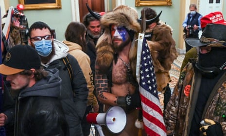 Jacob Chansley, wearing horns, at the Capitol on 6 January. 