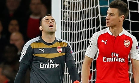 Arsenal’s David Ospina looks dejected after dropping the ball over his line against Olympiakos.