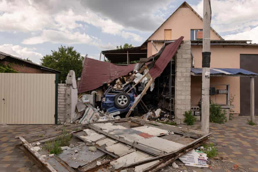 A damaged house marks a street on the outskirts of Mala Rohan.