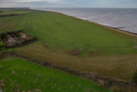 A view north along the receding Norfolk coastline from St Mary’s, Happisburgh.