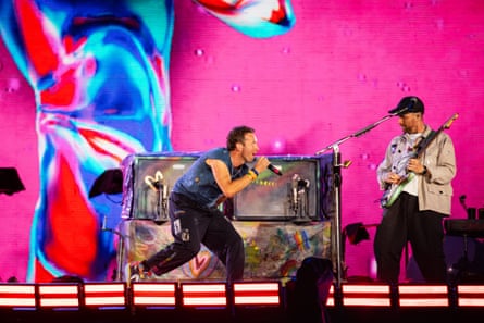 Chris Martin and Guy Berryman of Coldplay on stage at Craven Park, Hull