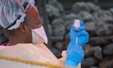 A nurse prepares an Ebola vaccine in Goma