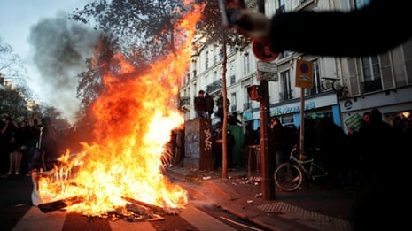 Protesters launch fireworks at police in Paris – video 