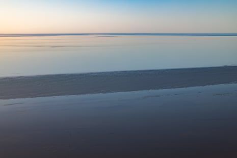 The Warburton Groove cuts through the still water of the lake