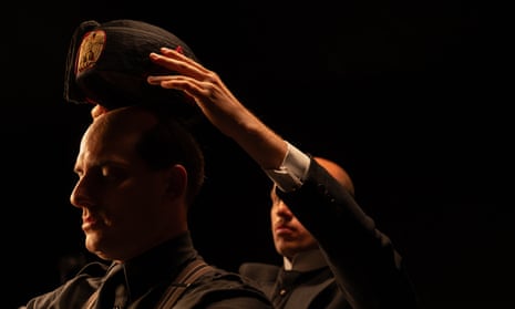 In this still from M: Son of the Century, the Fez El Duce, feature the fascist eagle, is put on the head of  Benito Mussolini (plated by the actor Luca Marinelli).