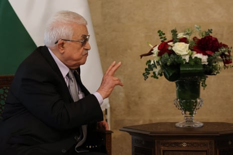 President Mahmud Abbas gestures during a meeting with Lebanon's president at the Presidential Palace in Baabda, on May 21, 2025.