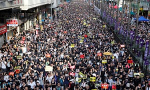 Anti-extradition bill protesters march during the anniversary of Hong Kong’s handover to China.
