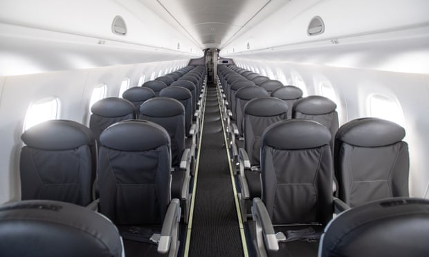 The cabin of an almost empty British Airways passenger plane