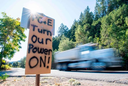 A road sign calls for PG&amp;E to turn the power back on in Calistoga, California.