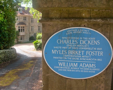 Blue plaque on a wall