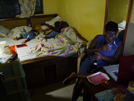 Late at night in a small home in Accra, Ghana.
