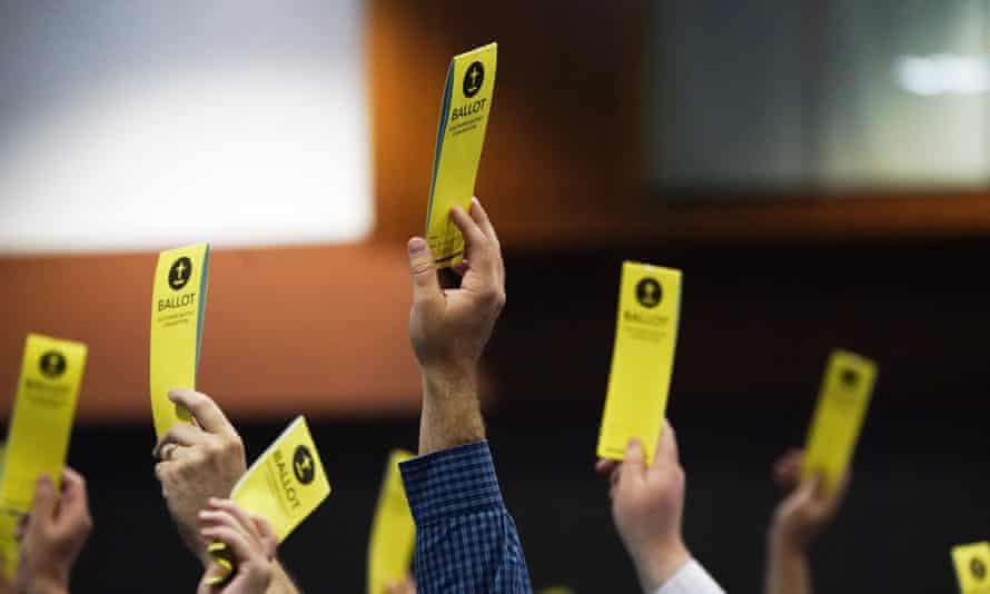 People vote on a motion during the annual Southern Baptist Convention meeting on 16 June 2021, in Nashville, Tennessee.
