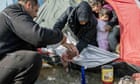 Greece promises refugee transfers as camp baby photo emerges