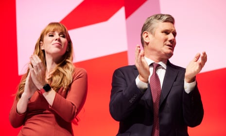 Keir Starmer and deputy leader Angela Rayner lead the singing of The Red Flag at the conclusion of the party’s conference in Liverpool on 28 September.