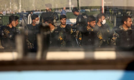 Iran's riot police forces stand in a street in Tehran, Iran October 3, 2022.