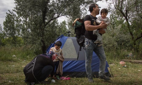 Yama Nayab and his family prepare to move camps awaiting their time to move onwards in to Hungary from Serbia. He was a surgeon in Afghanistan until he was stabbed by the Taliban. 
