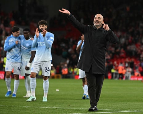 Enzo Maresca celebrates on the pitch after Manchester CityâÂÂs win against Liverpool.