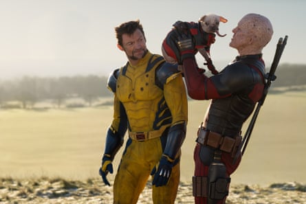 Puppy love … Jackman and Reynolds.