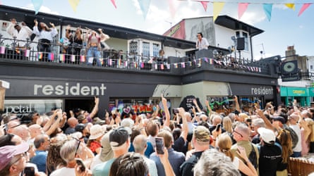 The view of Resident Records, with Nick Cave and the Bad Seeds performing on the balcony.