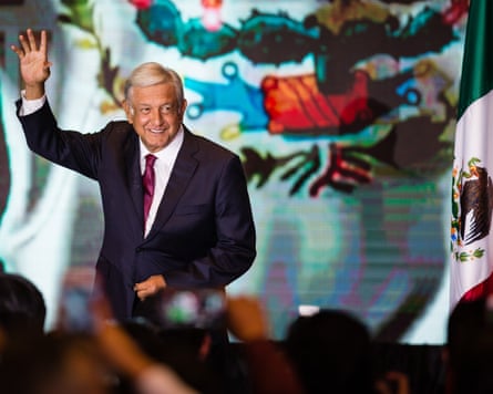 Andrés Manuel López Obrador waves to a crowd.