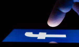 Facebook logo on phone