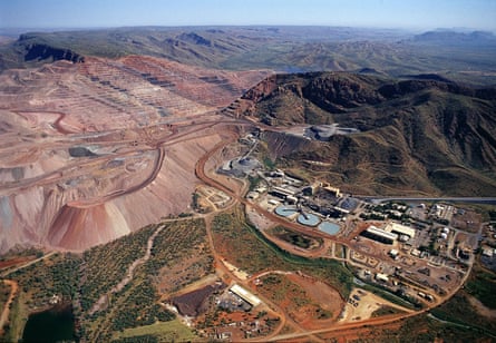 Overhead view of the mine and its buildings in a rocky, mountainous landscape with extensive quarrying.