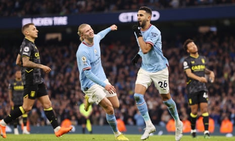 Riyad Mahrez celebrates after scoring their sides third goal from the penalty spot.