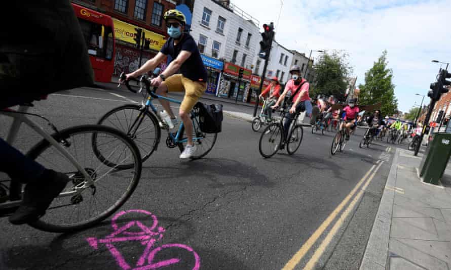 An Extinction Rebellion bike ride calling for more cycling and cycle lanes, London, May 2020